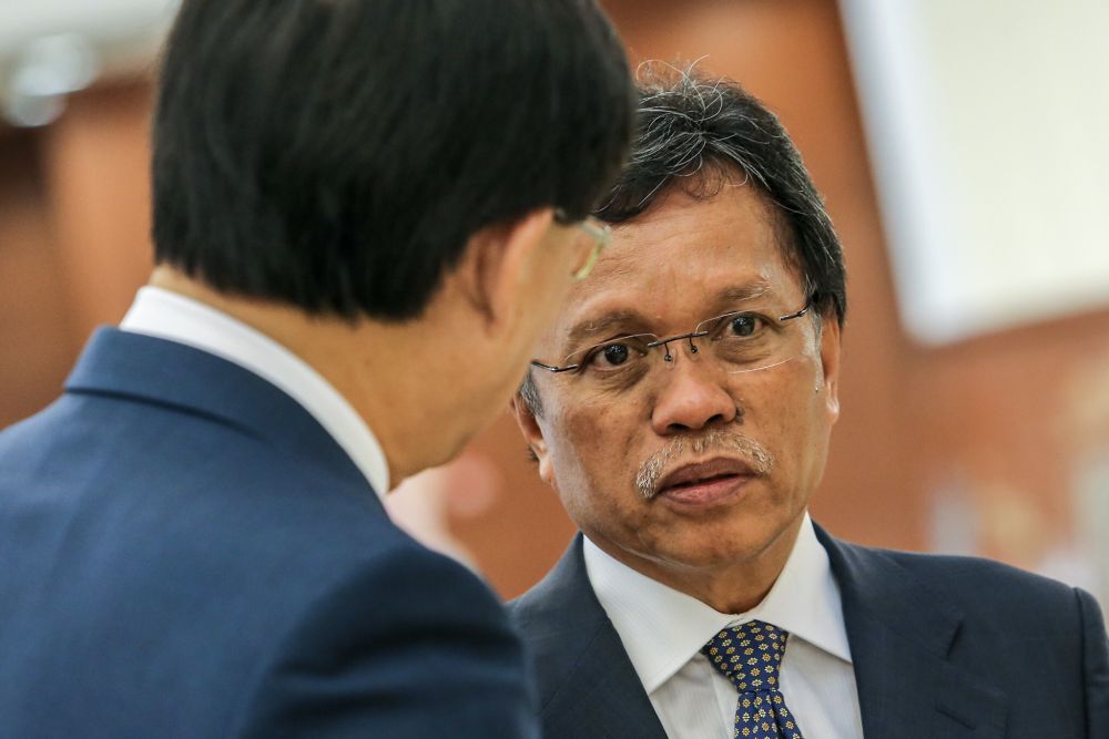 Sabah Chief Minister Datuk Seri Mohd Shafie Apdal (right) speaks to reporters in Parliament in Kuala Lumpur November 26, 2018. u00e2u20acu2022 Picture by Hari Anggara 