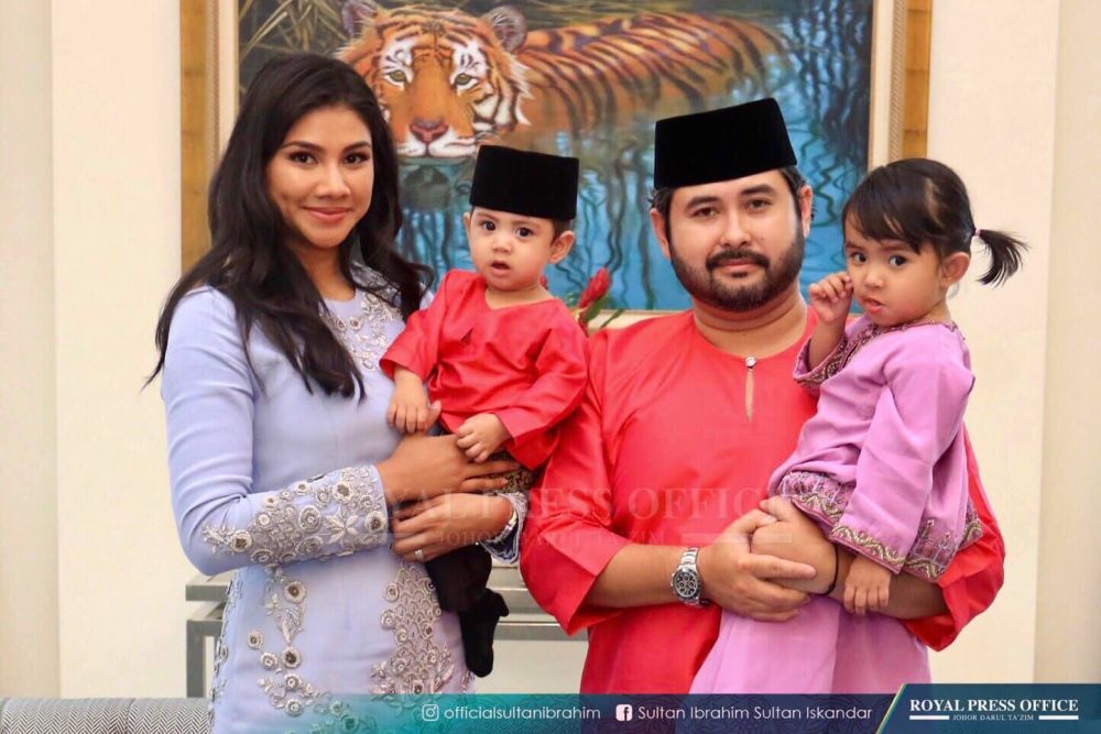 Newly proclaimed Raja Muda Johor, Tunku Iskandar Tunku Ismail, being held by his mother Che' Puan Khaleeda Bustamam (left).u00e2u20acu201d Picture courtesy of Johor Royal Press Office