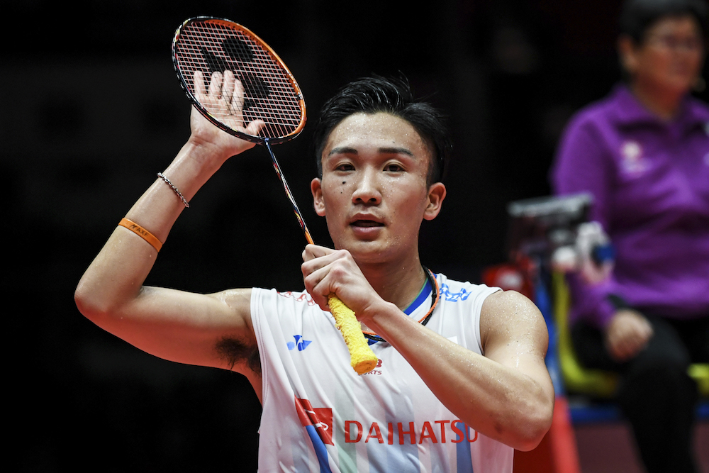 Kento Momota of Japan reacts after his menu00e2u20acu2122s singles third round match against Tommy Sugiarto of Indonesia at the 2018 BWF World Tour Finals of badminton in Guangzhou December 14, 2018. u00e2u20acu201d AFP pic