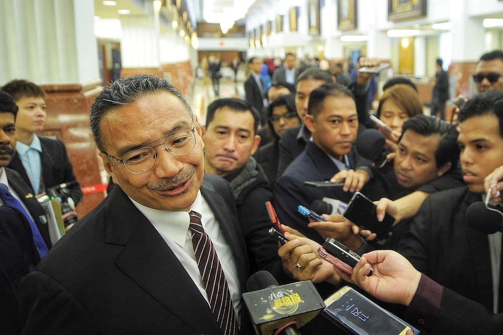 Datuk Seri Hishammuddin Hussein speaks to the media at the Parliament lobby, December 5, 2018. u00e2u20acu201d Picture by Shafwan Zaidon