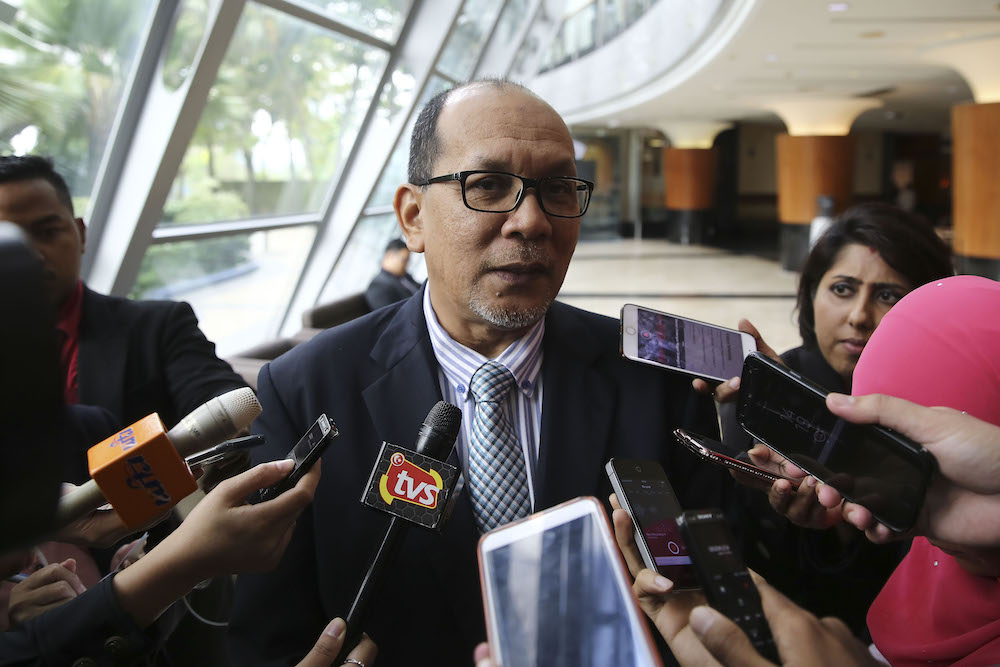 Izham Hashim speaks to reporters at the State Legislative Assembly building in Shah Alam December 5, 2018. u00e2u20acu201d Picture by Yusof Mat Isa