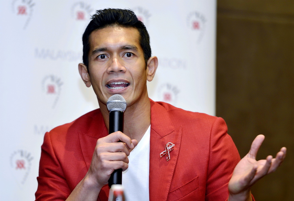 This year marks Fahrin Ahmad's 10th year of being a Red Ribbon Celebrity Supporter. u00e2u20acu201d Picture by Ham Abu Bakar