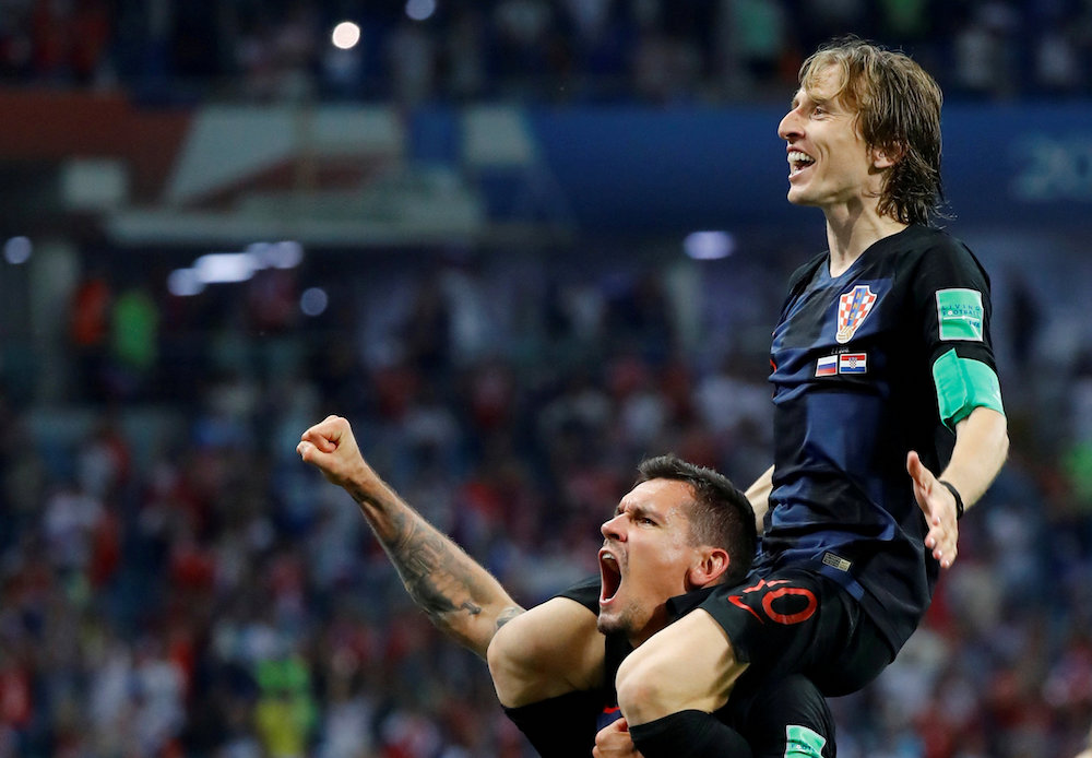 Croatiau00e2u20acu2122s Luka Modric and Dejan Lovren celebrate after the World Cup quarter-final match against Russia in Sochi July 7, 2018. u00e2u20acu201d Reuters pic