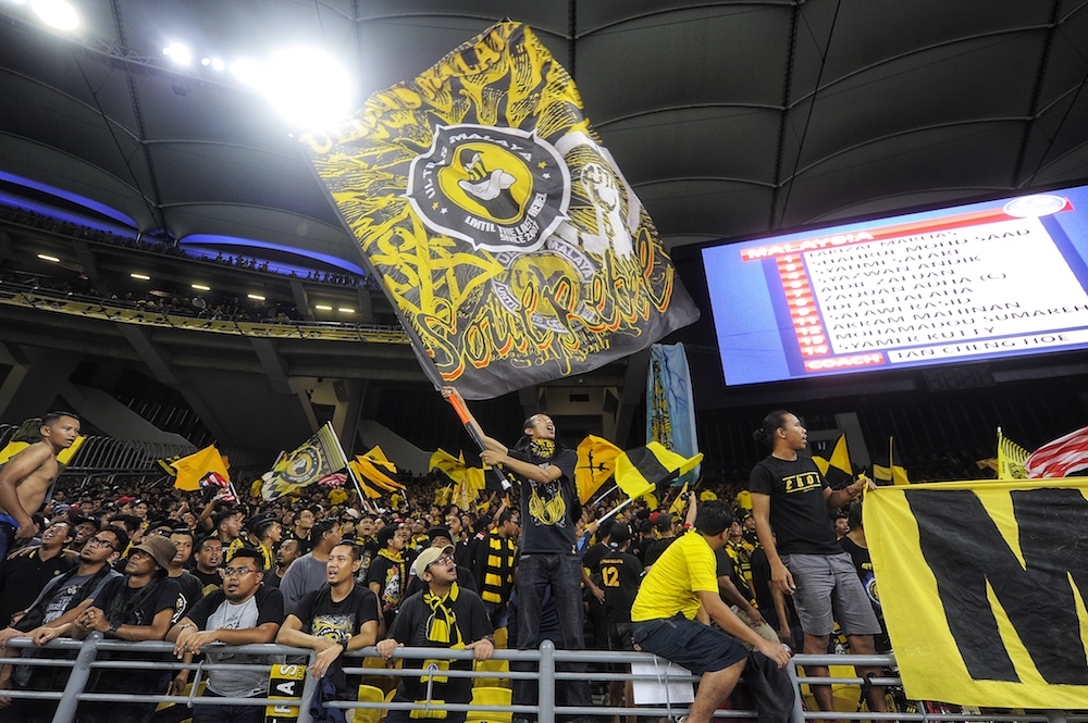 Supporters cheer during the 2018 AFF Suzuki Cup Group A match between Malaysia and Myammar at National Stadium Bukit Jalil in Kuala Lumpur November 24, 2018. u00e2u20acu201d Picture by Shafwan Zaidon