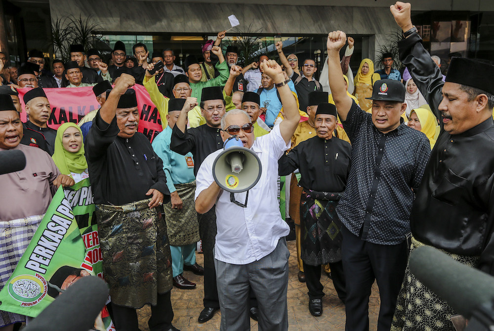 Perkasa president Datuk Ibrahim Ali speaks during the u00e2u20acu02dcHimpunan Jihad Perkasau00e2u20acu2122 rally in Kampung Baru, Kuala Lumpur December 2, 2018. u00e2u20acu201d Picture by Firdaus Latif