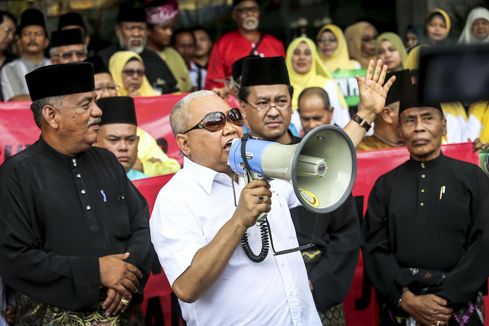 Perkasa president Datuk Ibrahim Ali speaks during the u00e2u20acu02dcHimpunan Jihad Perkasau00e2u20acu2122 rally in Kampung Baru, Kuala Lumpur December 2, 2018. u00e2u20acu201d Picture by Hari Anggara