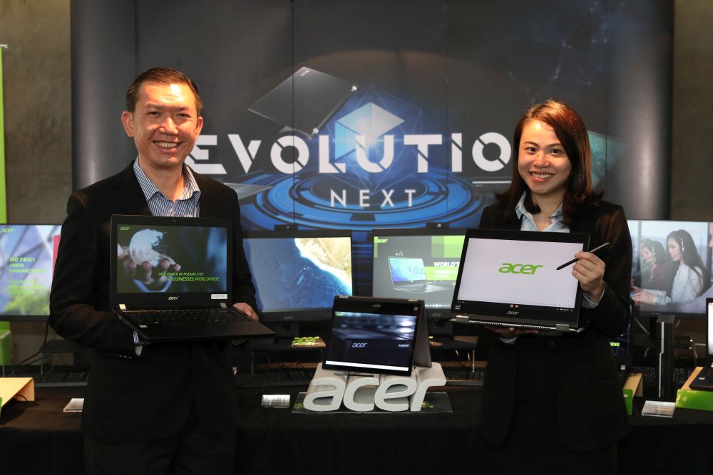 Acer Malaysia general manager of products, sales and marketing Chan Weng Hong (left) and senior product executive Soo Yun Sin (right) with the newly-revealed Acer commercial products. u00e2u20acu201d Picture courtesy of Acer Malaysia