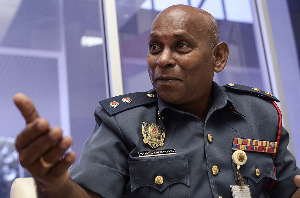 Senior fire Investigation Assistant Superintendent, M. Mahandran, speaks to Malay Mail about the collapse of Highland Towers Block 1 in Shah Alam December 8, 2018. u00e2u20acu201d Picture by Miera Zulyana