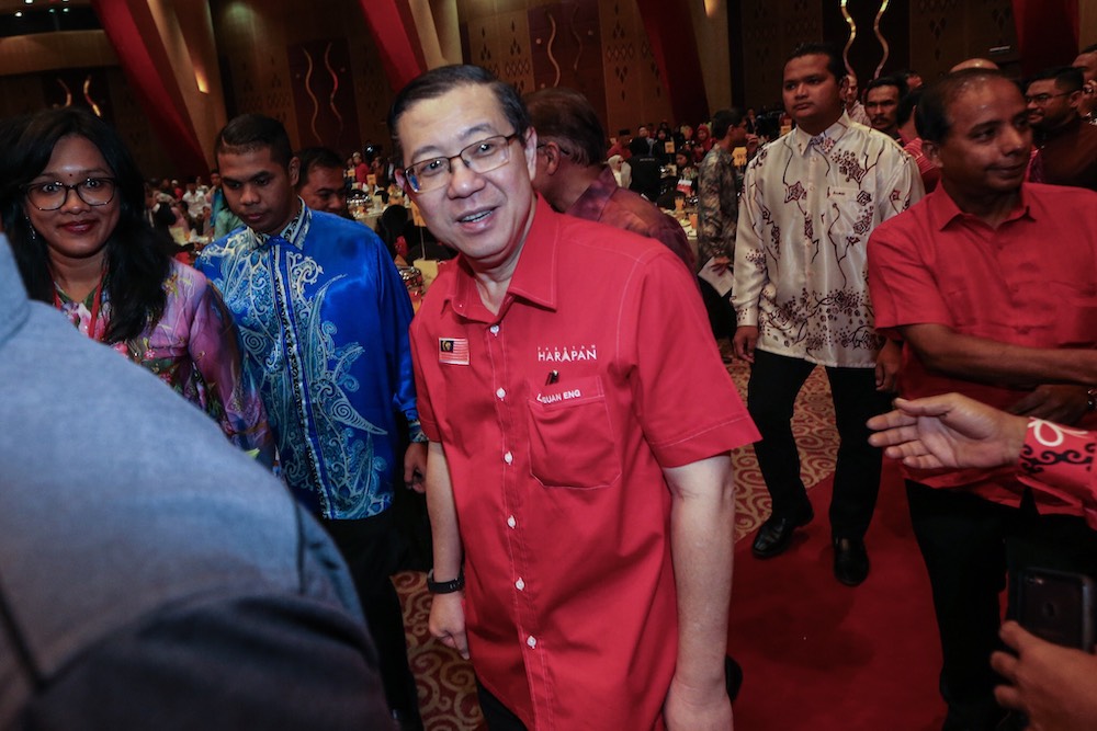 DAP Secretary-general, Lim Guan Eng (right), arrives at PICC for Pakatan Harapan charity dinner December 9, 2018. u00e2u20acu201d Picture by Hari Anggara.