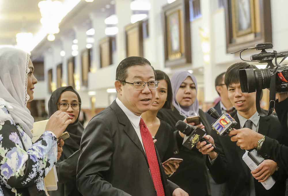 Lim Guan Eng speaks to reporters in Parliament December 10, 2018. u00e2u20acu201d Picture by Firdaus Latif