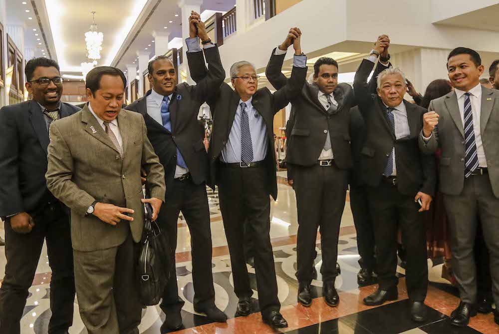 Barisan Nasional MPs walk out of Dewan Rakyat in a show of protest in Parliament December 10, 2018. u00e2u20acu201d Picture by Firdaus Latif