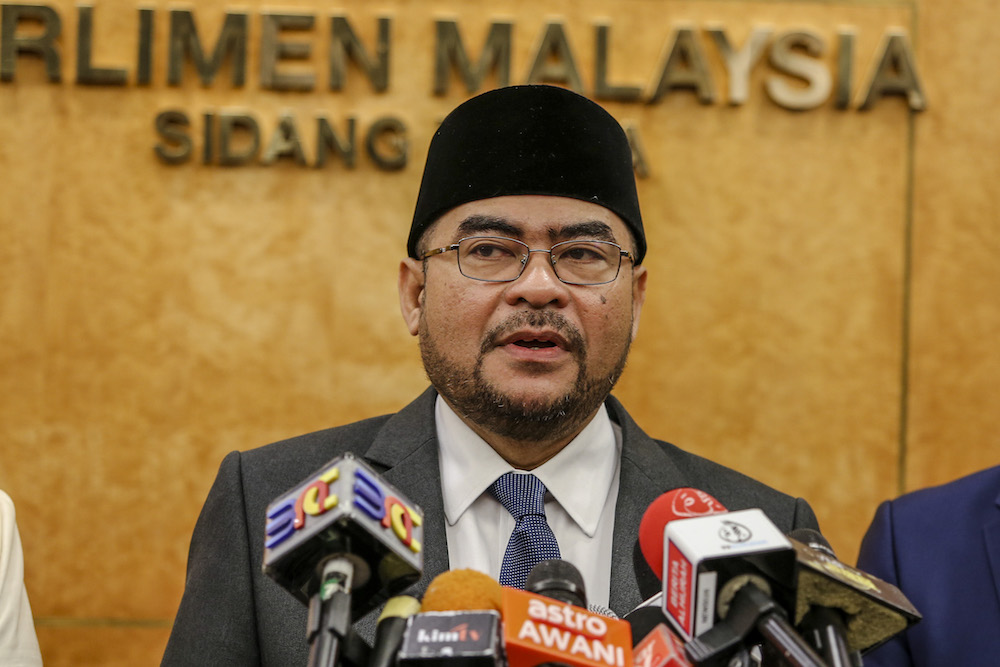 Minister in the Prime Ministeru00e2u20acu2122s Department Datuk Seri Mujahid Yusof Rawa speaks to reporters in Parliament December 10, 2018. u00e2u20acu201d Picture by Firdaus Latif