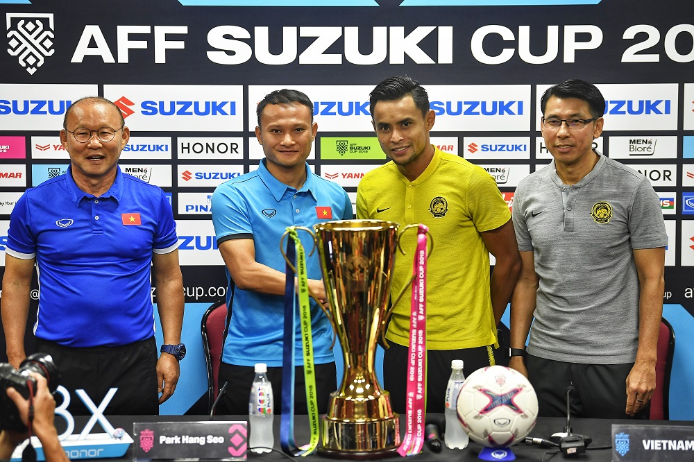 Vietnam coach Park Hang-seo, Vietnam captain Trong Hoang, Harimau Malaya captain Zaquan Adha Abdul Radzak and national head coach Tan Cheng Hoe during a press conference in Kuala Lumpur December 10, 2018 u00e2u20acu201d Picture by Shafwan Zaidon