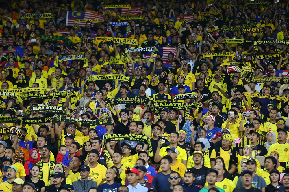Fans inside the Bukit Jalil National Stadium during the AFF Suzuki Cup final (first leg) match between Malaysia and Vietnam December 11, 2018. u00e2u20acu201d Picture by Ahmad Zamzahuri