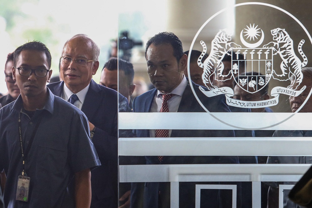 Former prime minister Datuk Seri Najib Razak arrives at the Kuala Lumpur High Court December 12, 2018. u00e2u20acu201d Picture by Hari Anggara