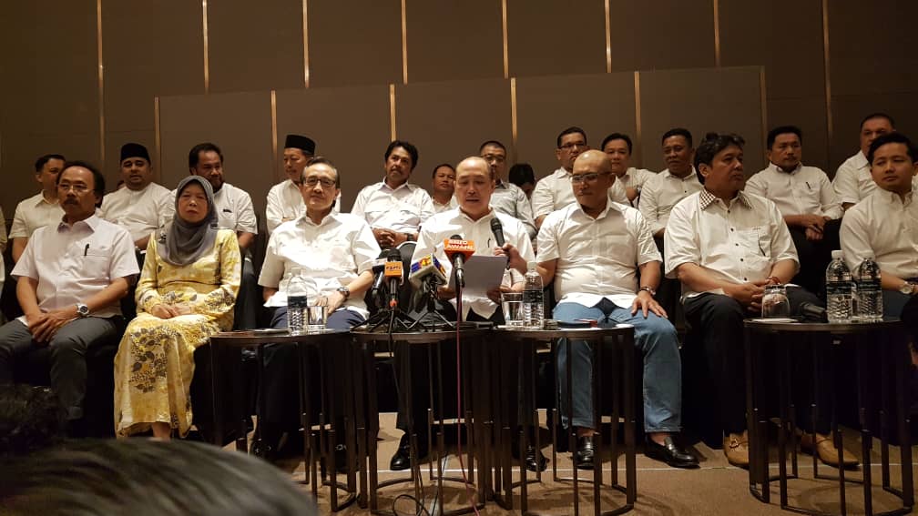 Datuk Hajiji Noor announced the mass exodus of Sabah representatives from Umno in Kota Kinabalu on December 12, 2018. u00e2u20acu201d Picture by Julia Chan