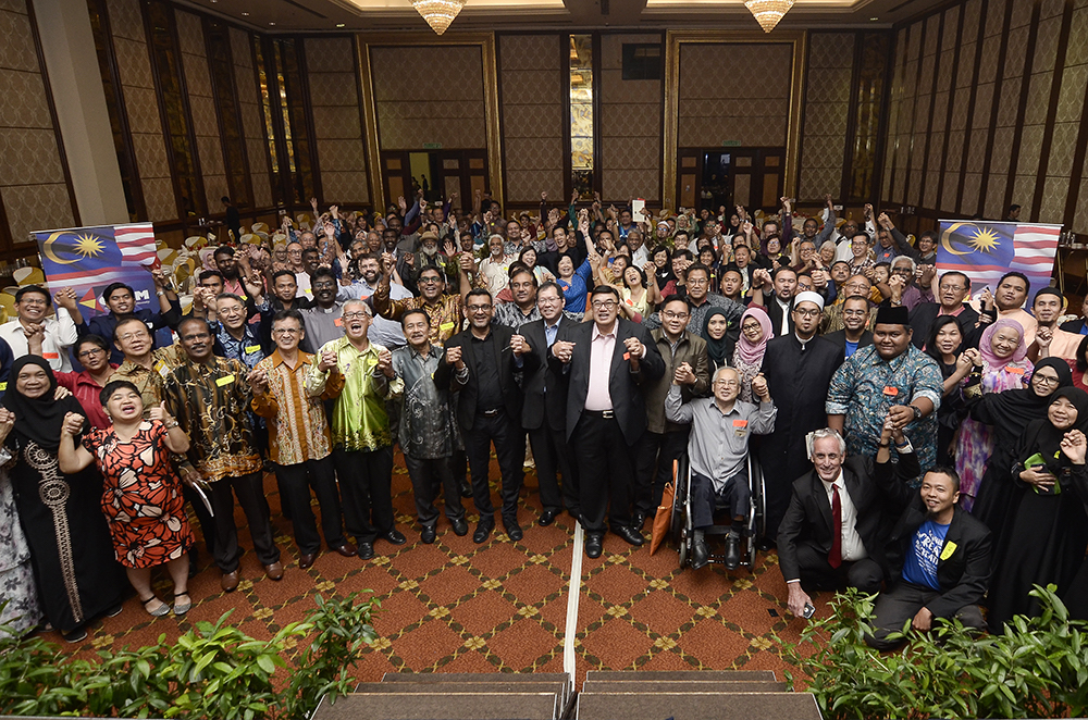 Guests take a group photo after the CPHM Chistmas Dinner in Subang Jaya December 13, 2018. u00e2u20acu201d Picture by Miera Zulyana
