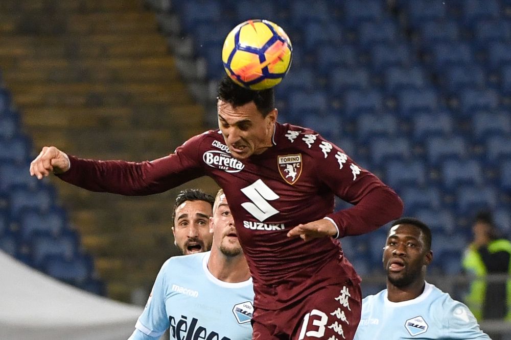 Torinou00e2u20acu2122s Argentinian defender Nicolas Burdisso (centre) heads the ball during the Italian Serie A football match Lazio versus Torino December 11, 2017 at the Olympic stadium in Rome. u00e2u20acu201d AFP pic