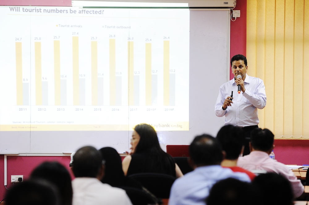 Associate director at Maybank Kim Eng, Mohshin Aziz, speaks during a public forum in Kuala Lumpur December 20, 2018. — Picture by Shafwan Zaidon