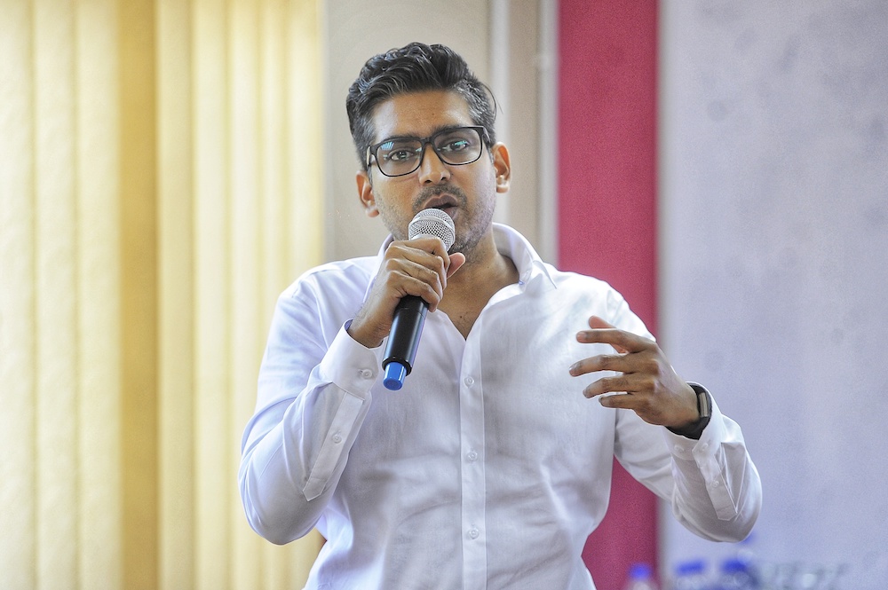 DAP Socialist Youthu00e2u20acu2122s (DAPSY) national vice chief, Muhammad Shakir Ameer, speaks during a public forum in Kuala Lumpur December 20, 2018. u00e2u20acu201d Picture by Shafwan Zaidon