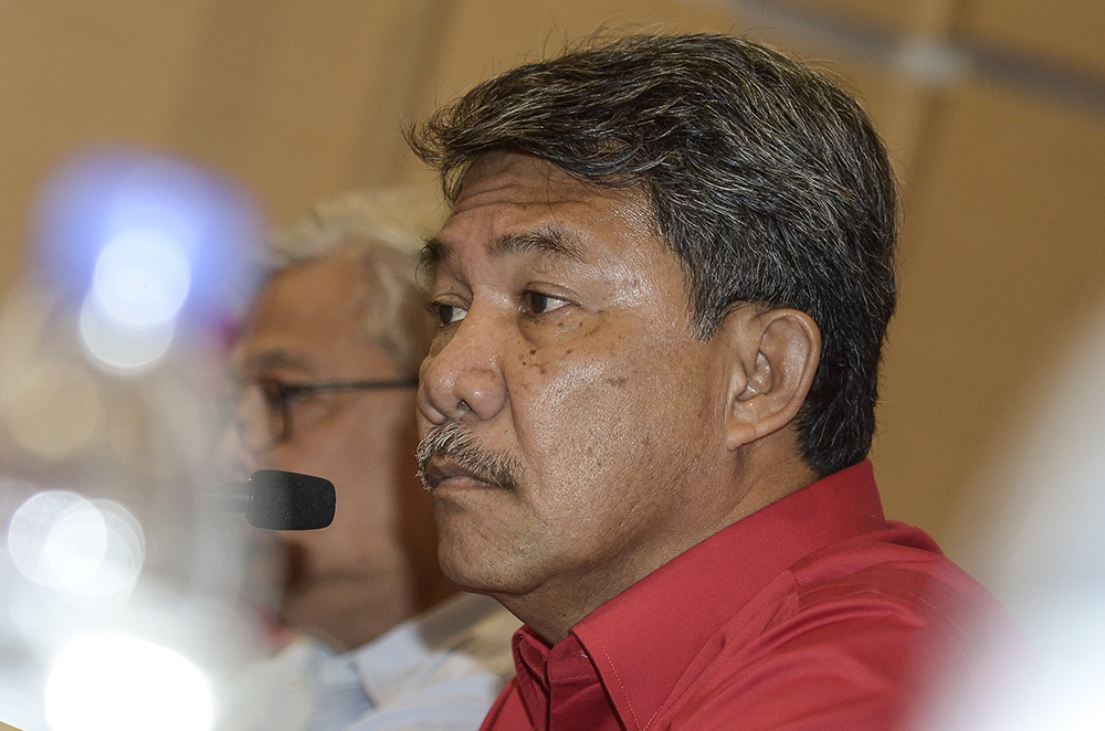 Datuk Seri Mohamad Hasan chairs an Umno Supreme Council meeting in Kuala Lumpur December 21, 2018. u00e2u20acu201d Picture by Miera Zulyana