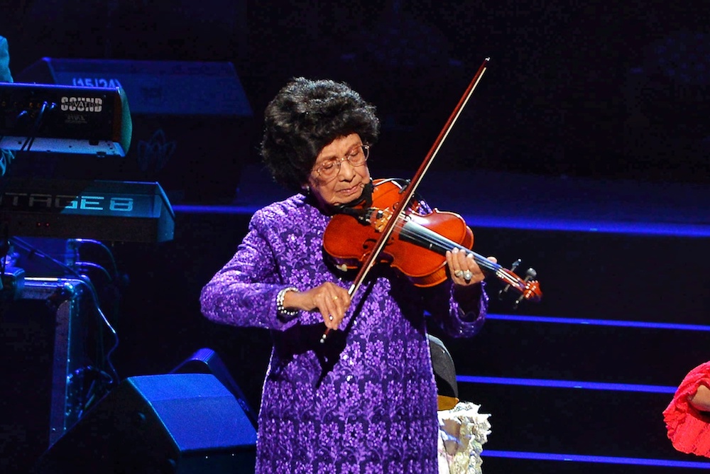 Tun Dr Siti Hasmah Mohd Ali plays the violin during the u00e2u20acu02dcDuo Lagendau00e2u20acu2122 concert at Istana Budaya in Kuala Lumpur December 22, 2018. u00e2u20acu201d Picture by Shafwan Zaidon