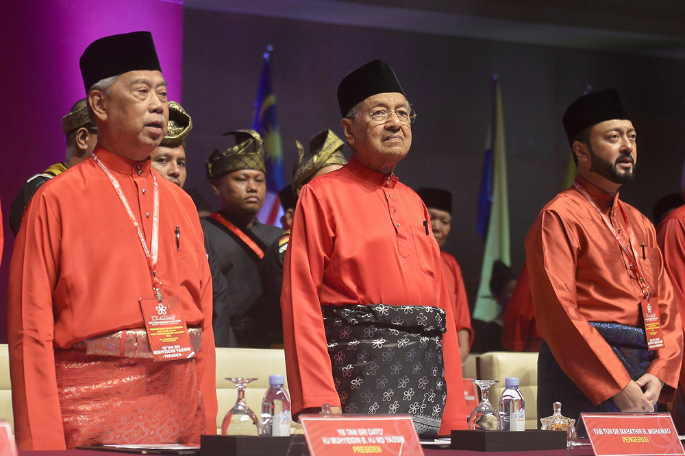 (From left) Tan Sri Muhyiddin Yassin, Tun Dr Mahathir Mohamad and Datuk Seri Mukhriz Mahathir attend the partyu00e2u20acu2122s second annual general meeting at Putrajaya International Convention Centre in Putrajaya December 29, 2018. u00e2u20acu2022 Picture by Mukhriz Hazim 