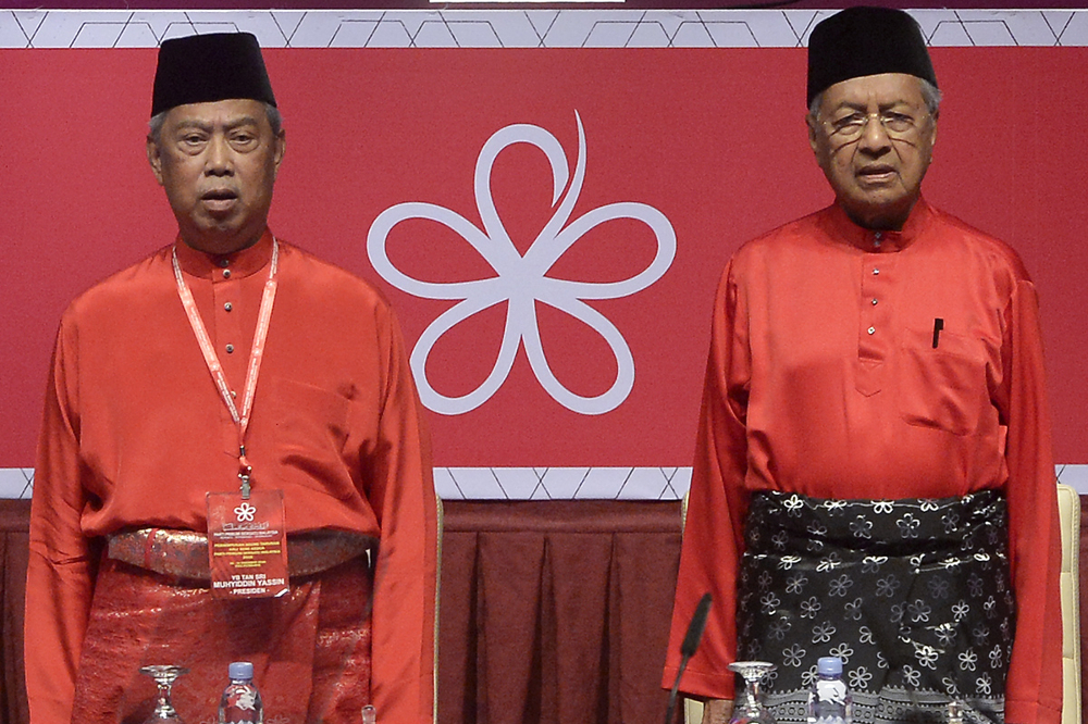 PPBMu00e2u20acu2122s president Tan Sri Muhyiddin Yassin and chairman Tun Dr Mahathir Mohamad attend the partyu00e2u20acu2122s second annual general meeting at Putrajaya International Convention Centre in Putrajaya December 29, 2018. u00e2u20acu2022 Picture by Mukhriz Hazim