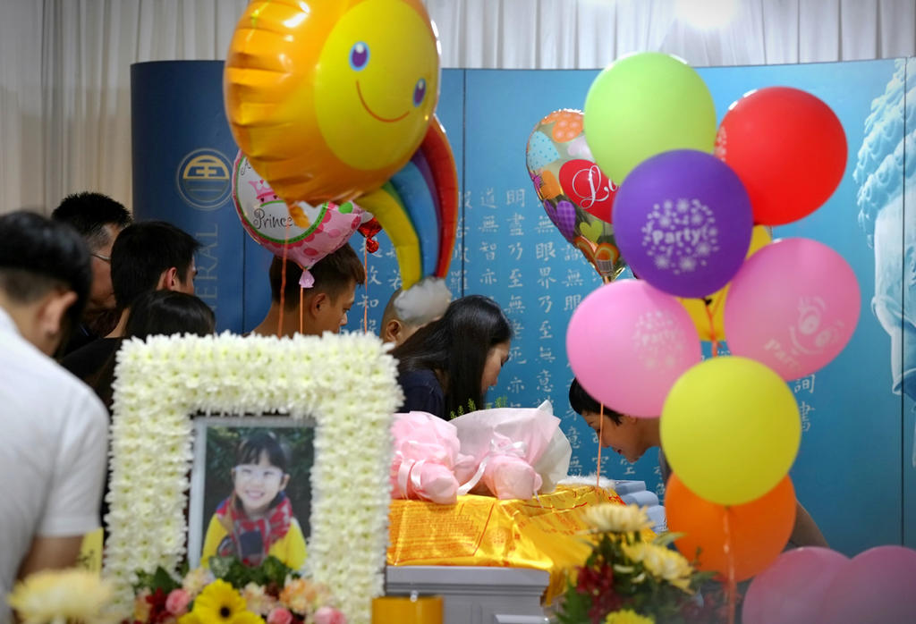 The funeral of Eleanor Tan Si Xuan, 4, who died in a road accident at Bukit Batok Central last October. u00e2u20acu201d Nuria Ling/TODAY pic