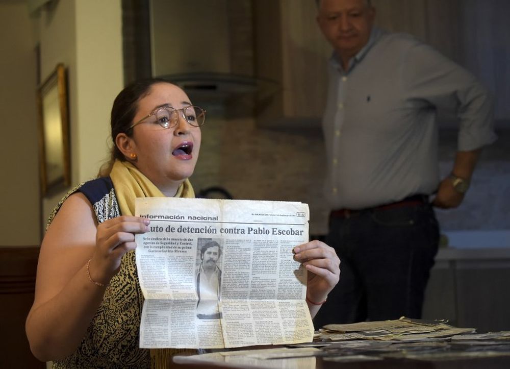 Siblings Carlos and Angela Zuluaga -whose father judge Gustavo Zuluaga (on picture) was killed by the late Colombian drug lord Pablo Escobar- speak during an interview with AFP in their house, November 28, 2018, in Medellin, Colombia. u00e2u20acu201d AFP pic