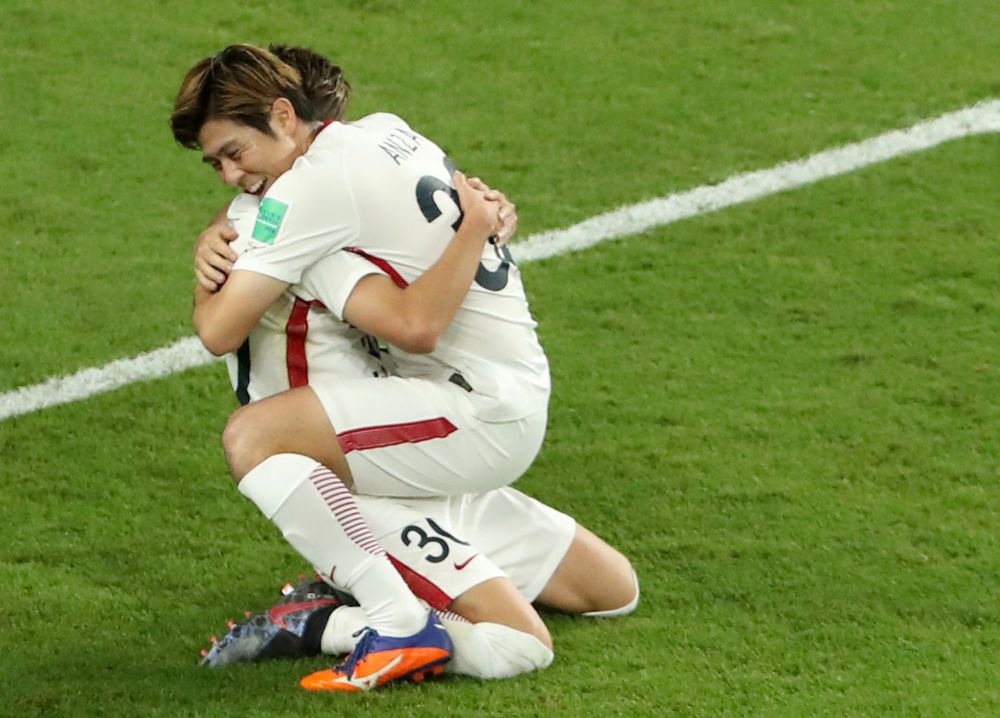 Kashima Antlers' Hiroki Abe celebrates scoring their third goal against CD Guadalajara with Koki Anzai. u00e2u20acu201d Reuters pic