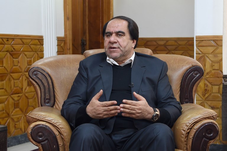 Afghan football boss Keramuddin Karim gestures as he speaks during an interview with AFP in Kabul on December 31, 2018. u00e2u20acu201d AFP pic