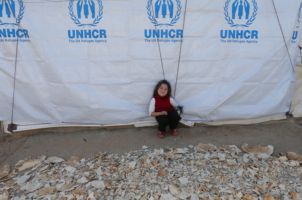 A Syrian refugee girl sits next to dried bread at a refugee camp in Akkar, northern Lebanon, November 27, 2018. u00e2u20acu201d Reuters pic      