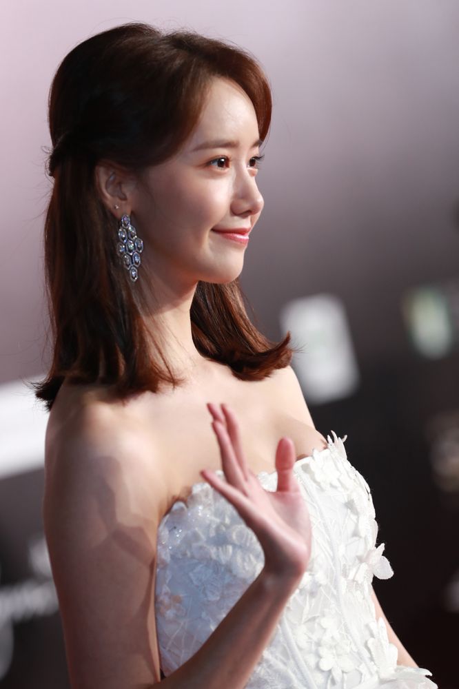 Fans gathered to cheer South Korean pop star and actress Im Yoon Ah as she made her way down the red carpet.