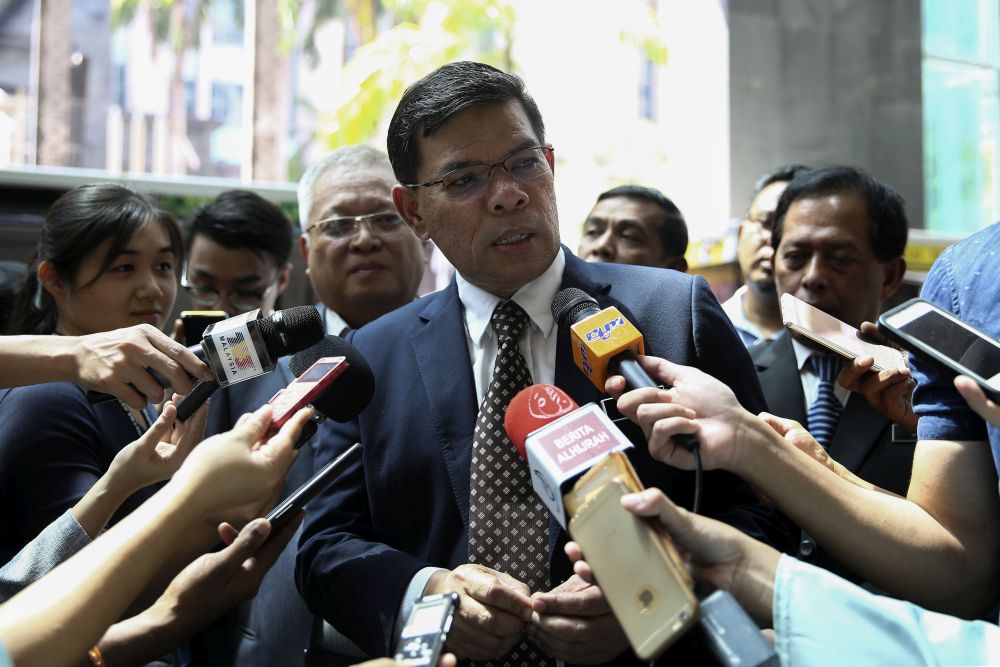 Minister of Domestic Trade and Consumer Affairs Datuk Seri Saifuddin Nasution Ismail speaks to reporters in Putrajaya December 20, 2018. u00e2u20acu2022 Picture by Yusof Mat Isa