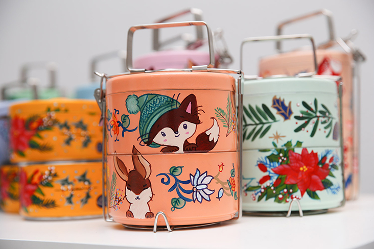 Adorable woodland creatures are paired with floral designs for these decorative tiffins