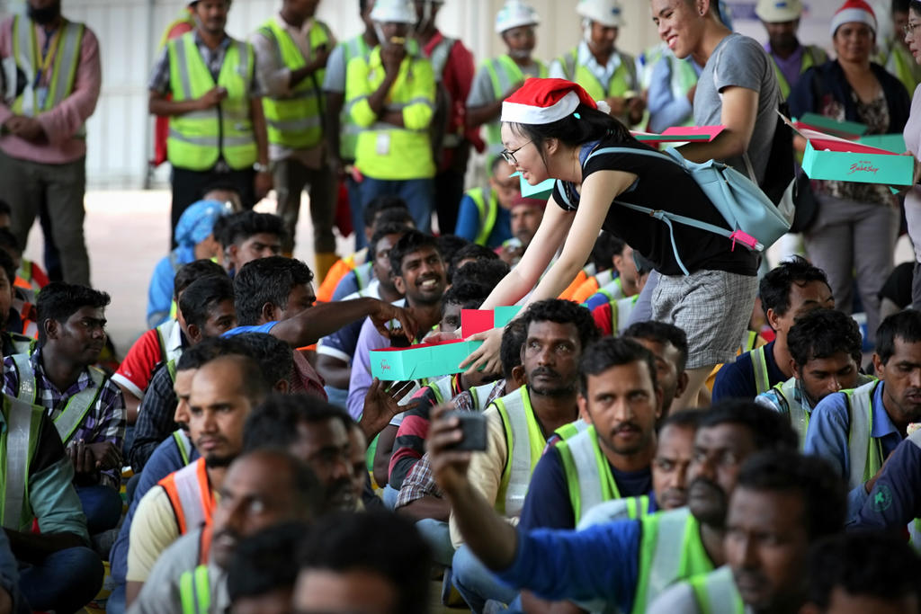 A total of 200 volunteers from ItsRainingRaincoats will be visiting several worksites this month to distribute the gifts to foreign workers. u00e2u20acu201d Nuria Ling/TODAY pic