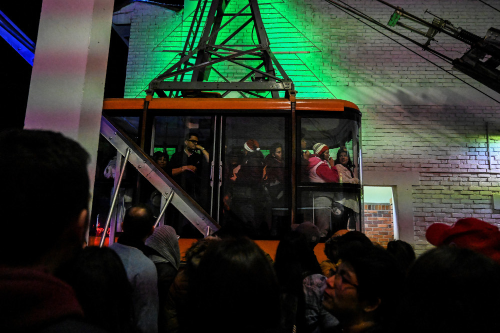 People stand in a cable car atop Monserrate mountain in Bogota on December 23, 2018. u00e2u20acu201d AFP pic 