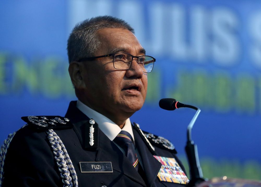IGP Tan Sri Mohamad Fuzi Harun speaks during the handover ceremony in Kuala Lumpur December 5, 2018. u00e2u20acu2022 Picture by Razak Ghazali