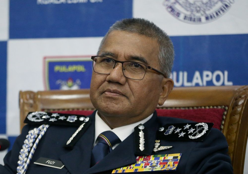 IGP Tan Sri Mohamad Fuzi Harun speaks during the handover ceremony in Kuala Lumpur December 5, 2018. u00e2u20acu2022 Picture by Razak Ghazali
