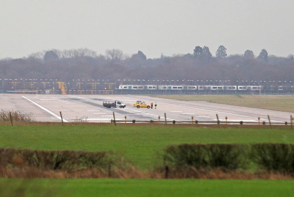 Airport vehicles stand on the closed runway at Gatwick Airport after drones flying illegally over the airfield forced the closure of the airport, in Gatwick, Britain December 20, 2018. u00e2u20acu201d Reuters pic