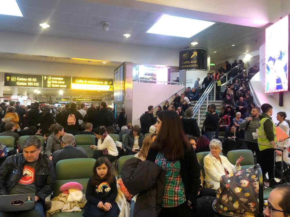 Stranded passengers wait at Gatwick Airport, Britain, December 20, 2018 in this picture obtained from social media. u00e2u20acu201d Reuters pic 