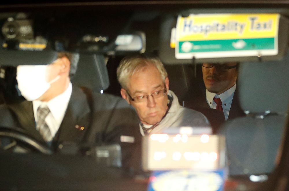 Greg Kelly, the former deputy of ousted Nissan chairman Carlos Ghosn, is seen in the car, as he leaves after being released from a detention centre in Tokyo December 25, 2018. u00e2u20acu201d Reuters pic 
