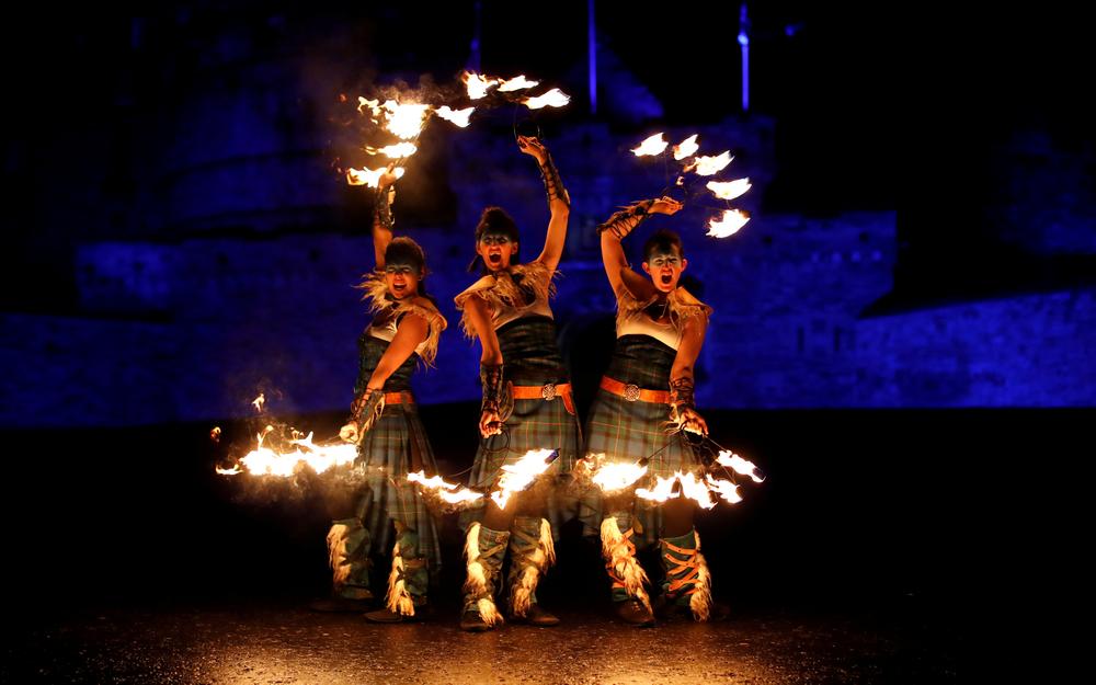 Members of PyroCeltica pose in front of Edinburgh Castle in advance of Edinburgh's Hogmanay torchlit procession down the Royal Mile in Edinburgh, Scotland December 30, 2018. u00e2u20acu201d Reuters pic