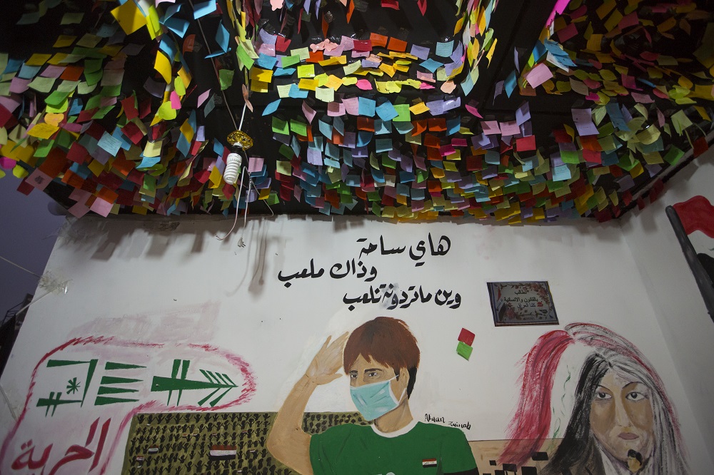 A mural representing an Iraqi pupil saying u00e2u20acu02dcthis is a public square, and that is a schoolyard...we can play wherever you wantu00e2u20acu2122, is seen under sticky notes bearing wishes of anti-government demonstrators in Baghdad December 3, 2019. u00e2u20acu201d AFP pic   
