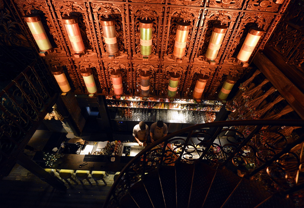 Iron Fairies KL is imagined as a fairy dust factory with countless vials of fairy dust hanging from the ceiling and walls.