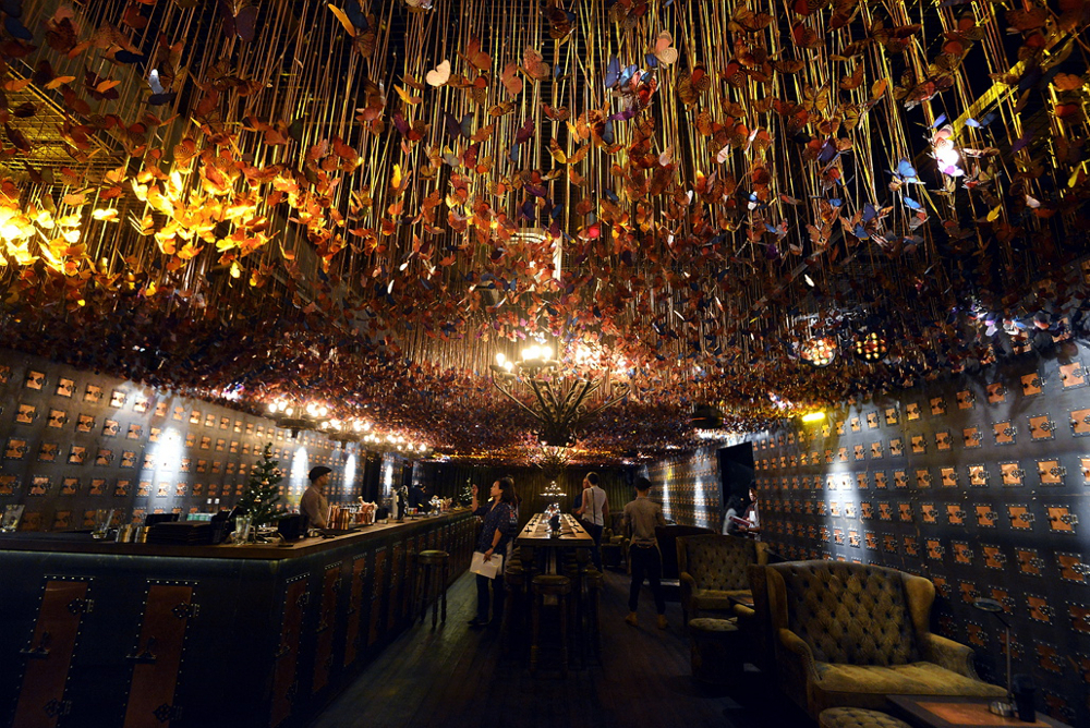 The Butterfly Bar, a room where a DJ spins tunes while 50,000 butterflies float from the ceiling, creates an otherworldly sense of time being suspended.