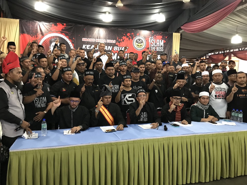 A total of 35 NGOs under Jabat demanded justice for Adib. u00e2u20acu201d Picture by John Bunyan