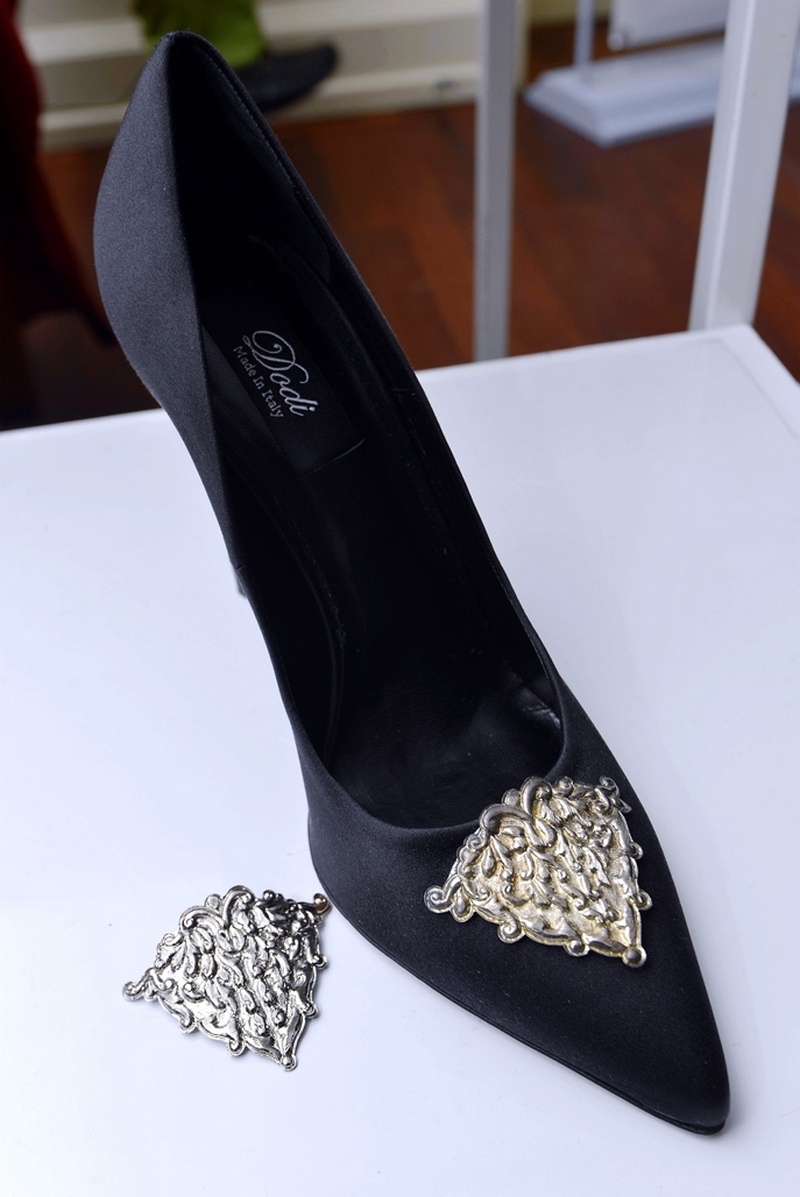 The elegant black Italian handmade shoe is enhanced with the handcrafted silver piece made by the Kelantan silversmith artisans.