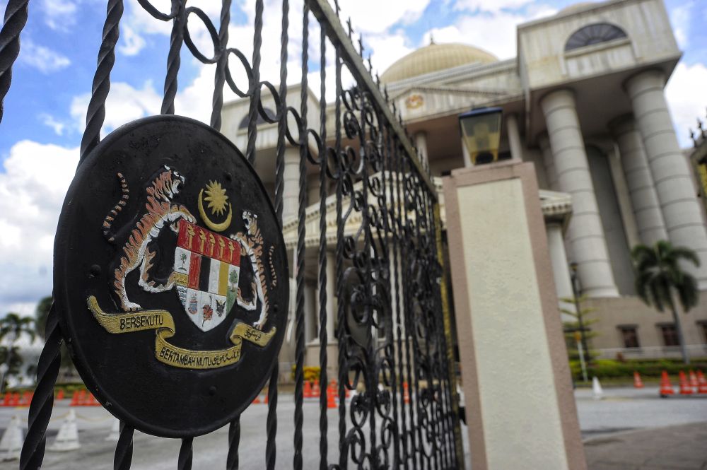 In a separate High Court later, judge Datuk Muhammad Jamil Hussin also allowed Najib’s application for his impounded passport to be temporarily returned during those dates. — Picture by Shafwan Zaidon